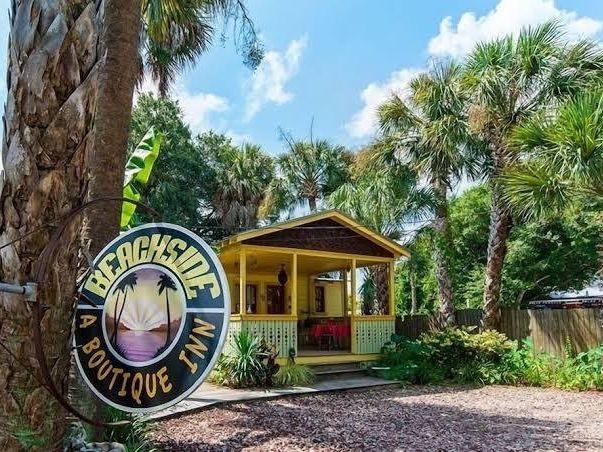 Beachside Boutique Inn blends cozy island charm with tropical surroundings, offering a colorful and inviting stay just steps from the beach.