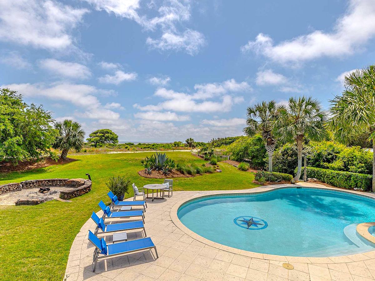 View of Private Pool and Ocean from the deck of luxury St. Simons Island Vacation rental
