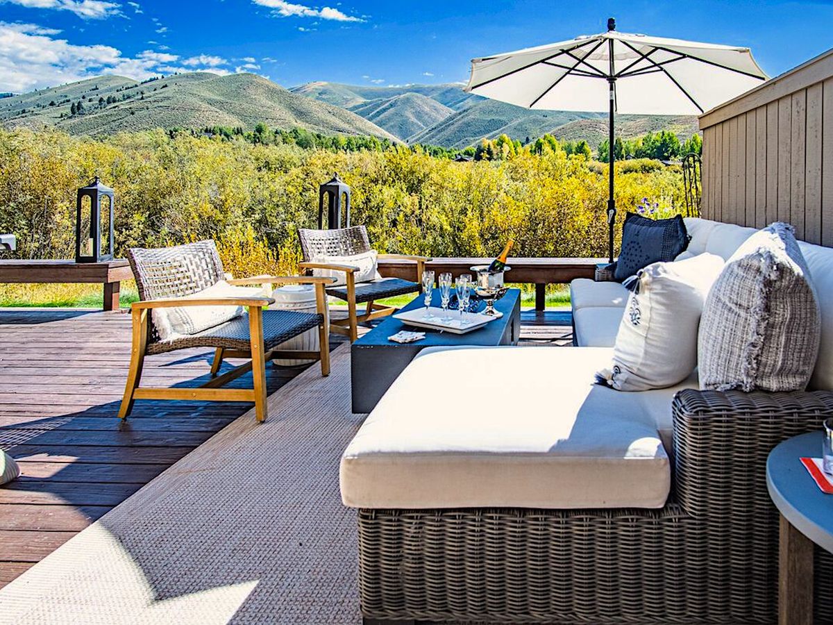 View of Mountains and Outside Seating Area at Luxury Sun Valley ID Vacation Rental