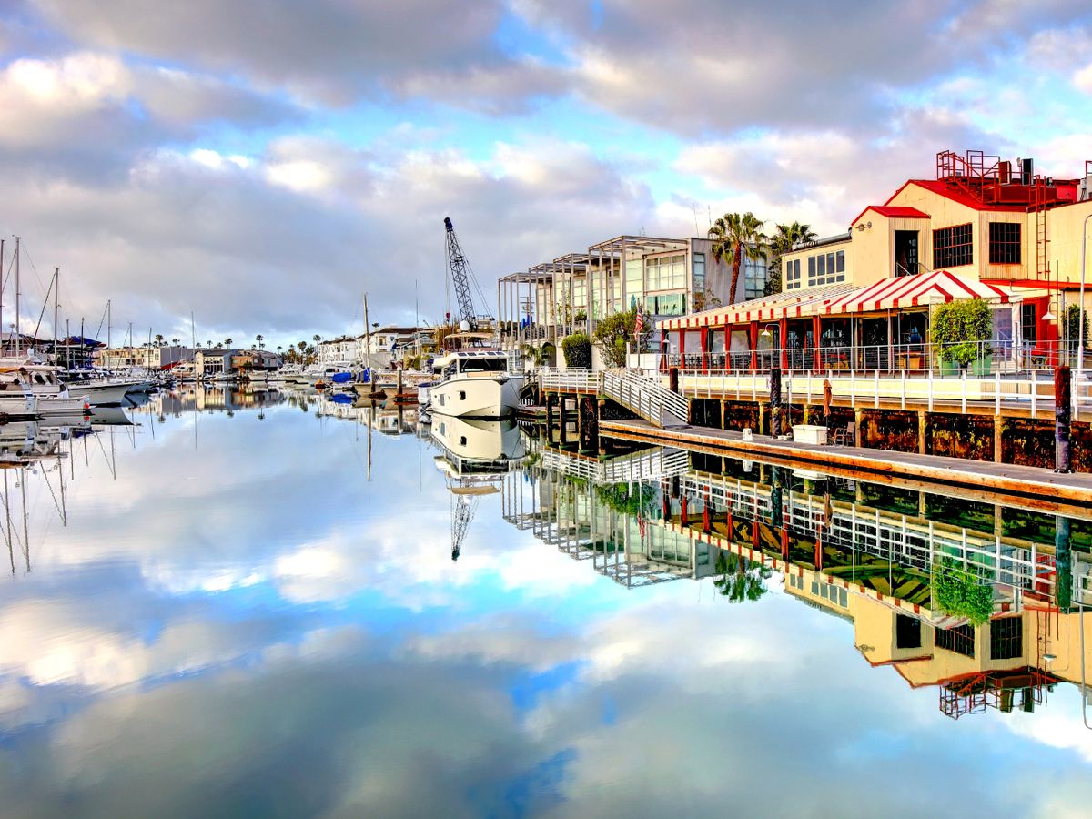 View of Newport Beach Marina with Boats and Restaurant
