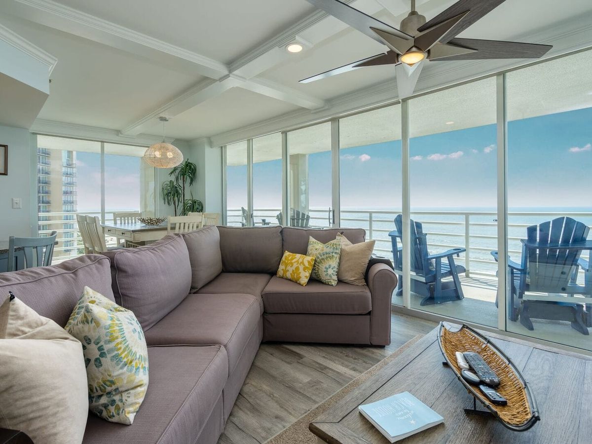 Peaceful oceanfront balcony with padded lounge chairs and views that stretch for miles. A quiet escape with plenty of room to unwind, read a book, or watch the waves roll in.