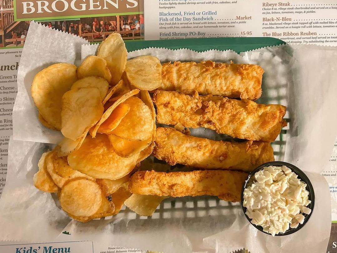 Crispy fried fish sticks and golden kettle chips are served with a side of creamy coleslaw at Brogen’s. This crowd favorite is the perfect beach-town comfort meal on St. Simons Island.