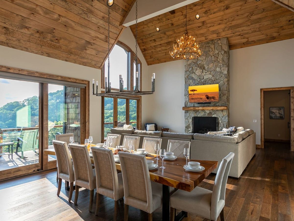 Up and Away at Eagles Nest is a luxury lodge in Banner Elk with room for the whole crew. This spacious cabin features a hot tub, gourmet kitchen, and incredible views from every window.