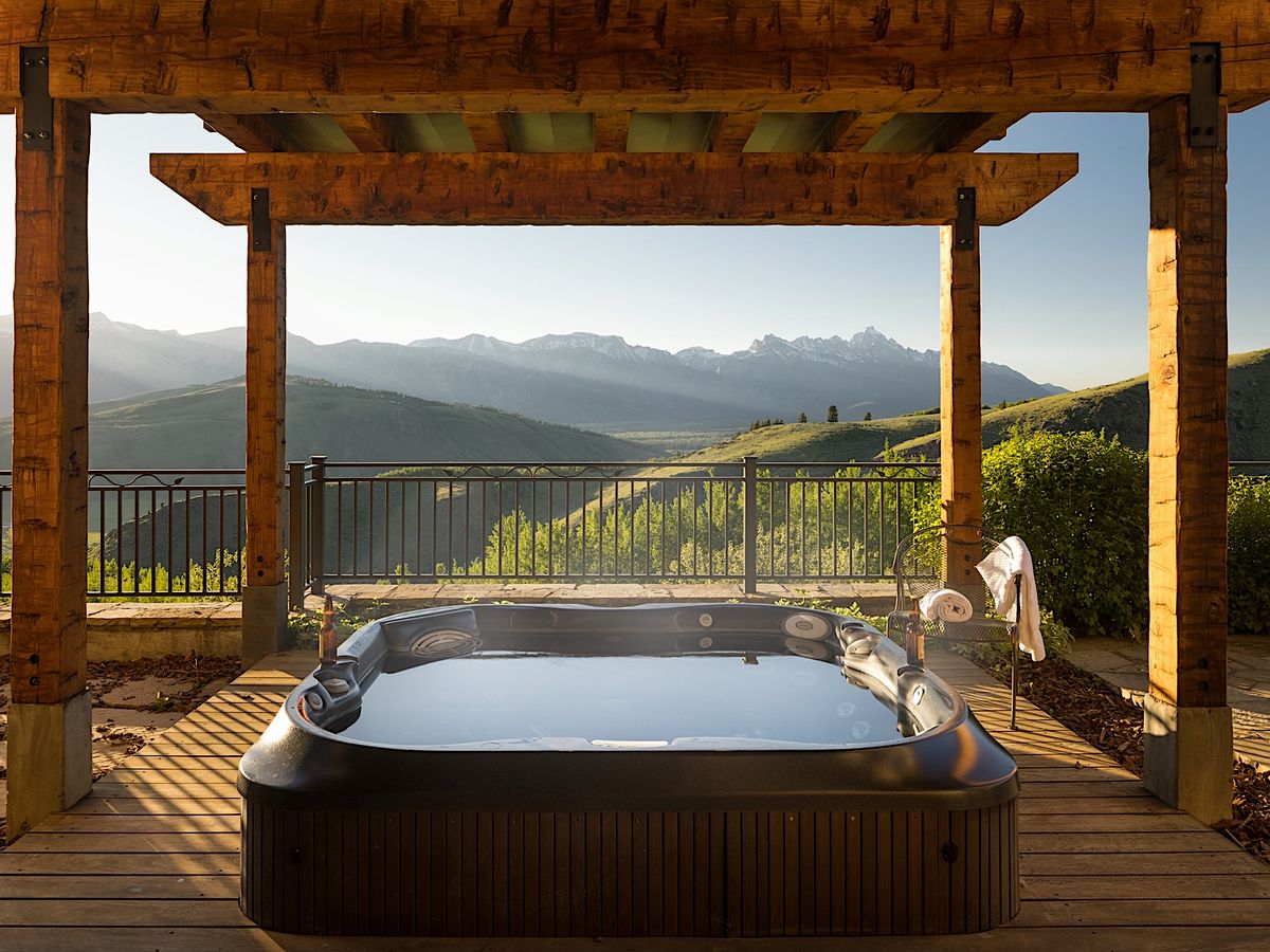 Outdoor Hot Tub With Panoramic Mountain Views At Luxury Jackson Hole Vacation Rental