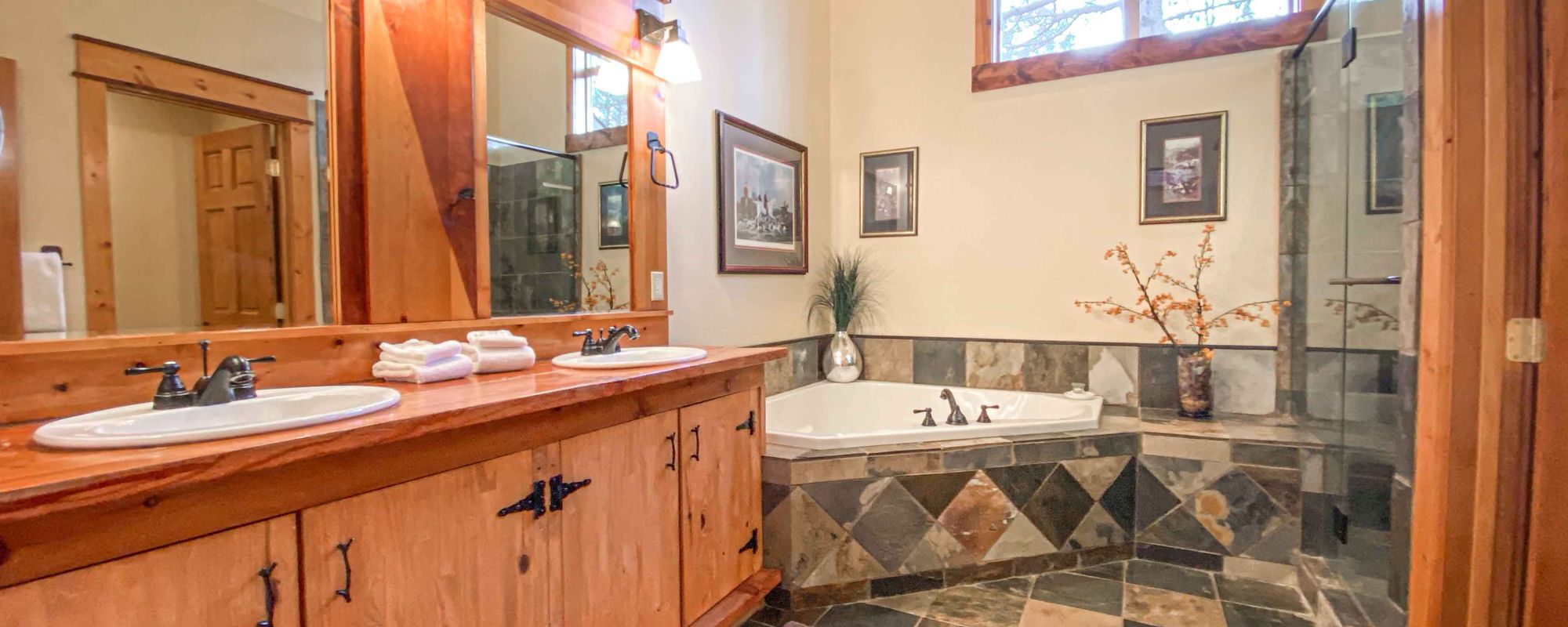 Spacious modern bathroom in a Cascara Vacation Rentals home.