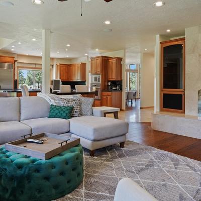 Interior living space with fireplace in a Bend, OR vacation rental.