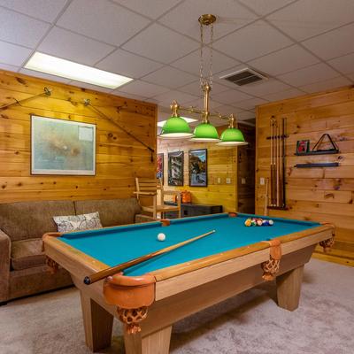 Game room with pool table in Highgarden Lodge.