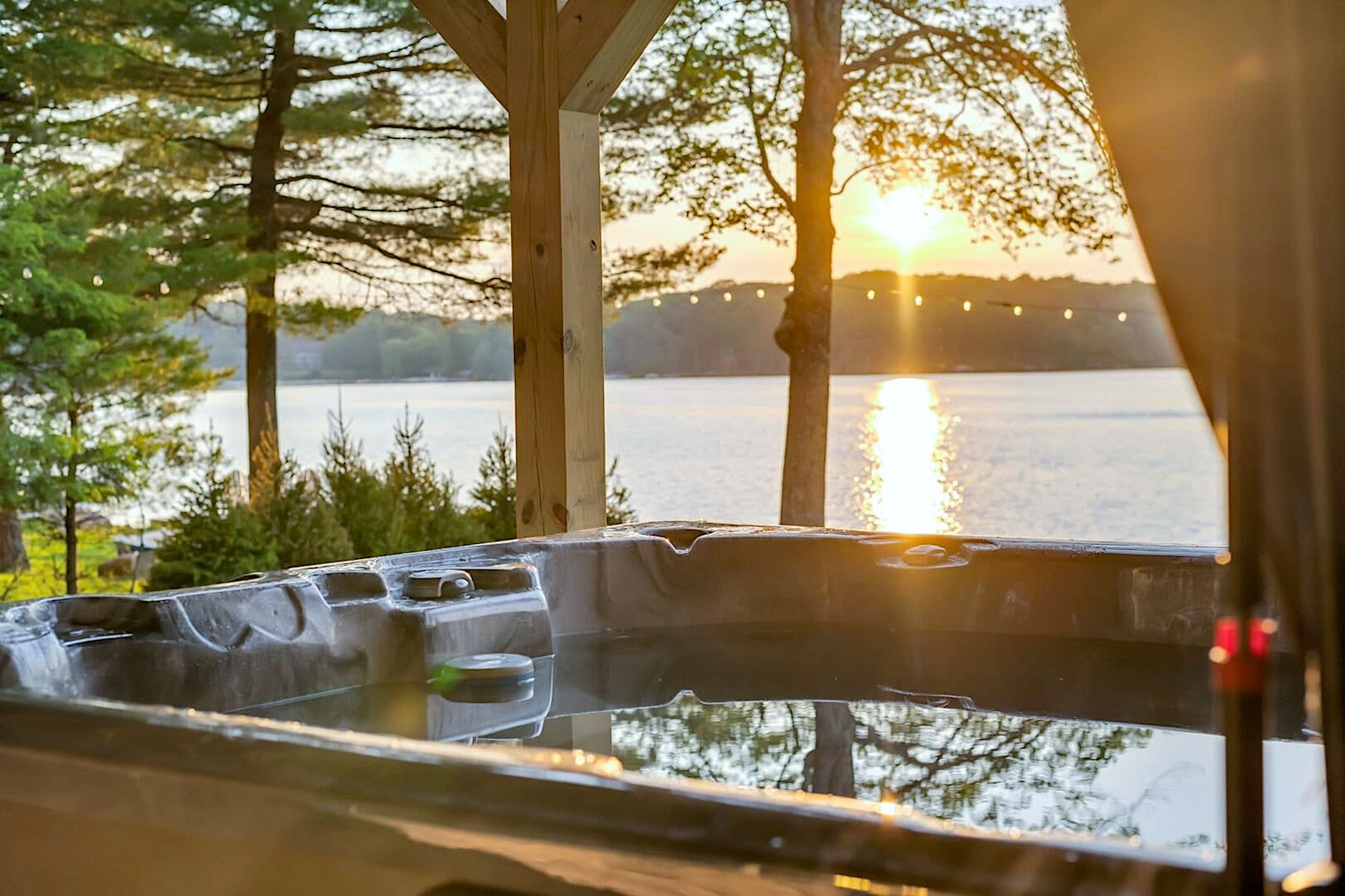 Sunset View Of Lake Harmony From A Luxury Poconos Vacation Rental Hot Tub