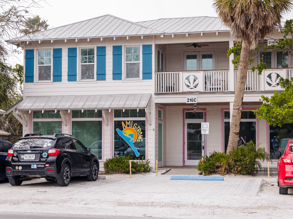 Pine Avenue’s colorful storefronts and palm-lined street capture the island charm of Anna Maria’s shopping district.