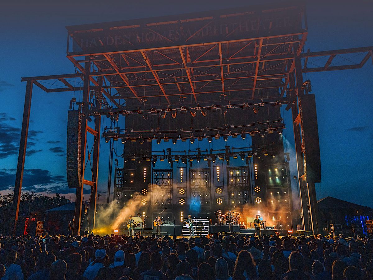 Amphitheater in Bend, OR at Night with Band and Crowds
