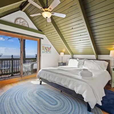 Bedroom with views of scenic vistas in Rocky Ridge.