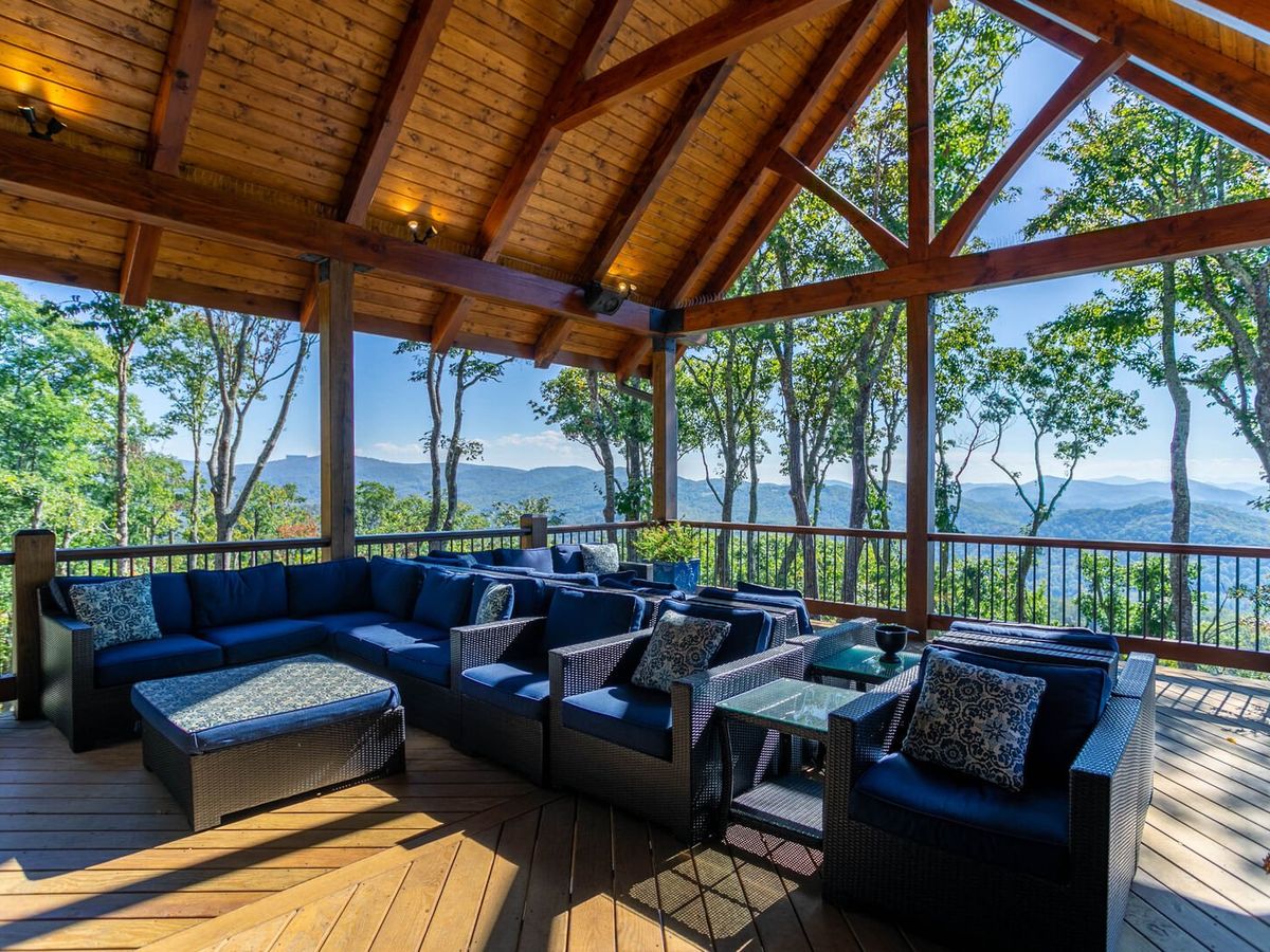 View of Blue Ridge Mountains from luxury Vacation Rental Deck and Seating area