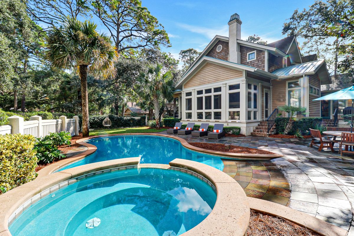 Exterior view of a Hilton Head Island vacation rental with a private pool.