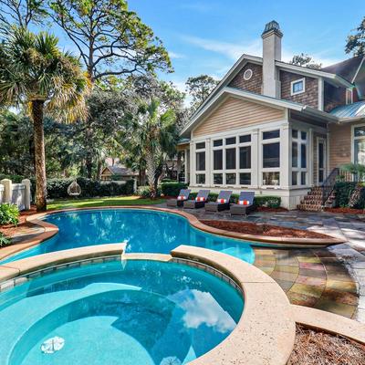 Exterior view of a Hilton Head Island vacation rental with a private pool.