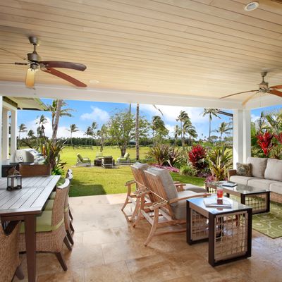 Outdoor lounge space with ceiling fans