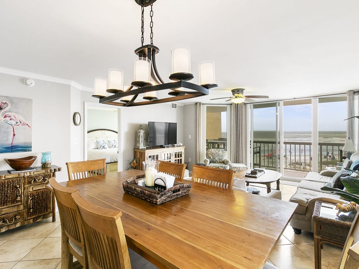 Oceanfront vacation home with wraparound decks and a private boardwalk leading straight to the beach. This Folly Beach property offers easy access to the sand and beautiful views from every level.