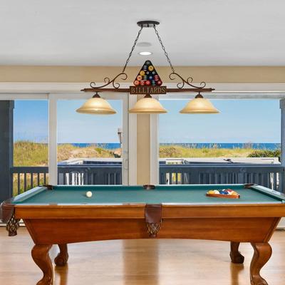 Pool table with water view in a luxury Outer Banks vacation rental