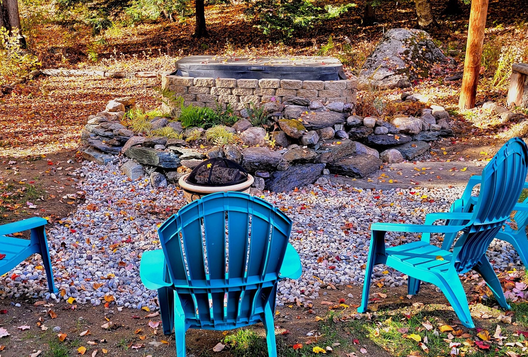 Hot Tub Surrounded by Forrest At A Luxury Killington Vacation Rental