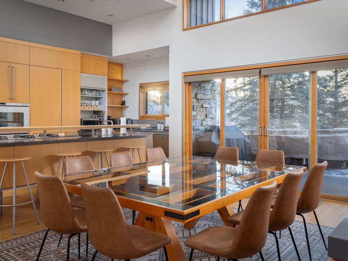 Adams Way Gray Mill House in Telluride blends rustic cedar charm with high-end luxury. From the hot tub to the wet bar, this mountain home has all the comforts and stunning views.