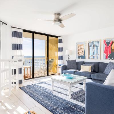 Living room with views in a Folly Beach vacation rental.