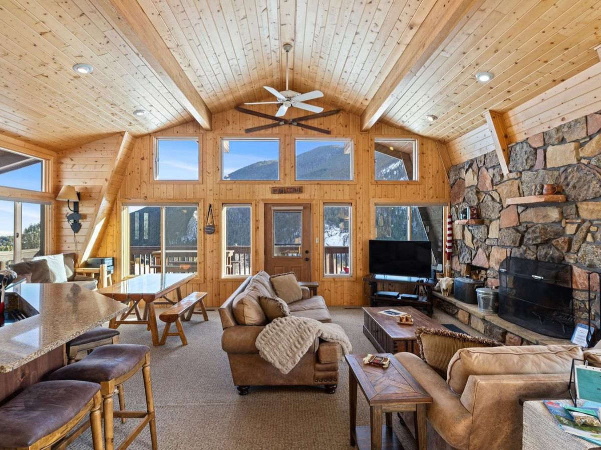 West Fork Haven in Red Lodge, MT has that classic log cabin charm with a stone fireplace and cozy touches. After a day on the trails, soak in the hot tub or gather around the fire pit.