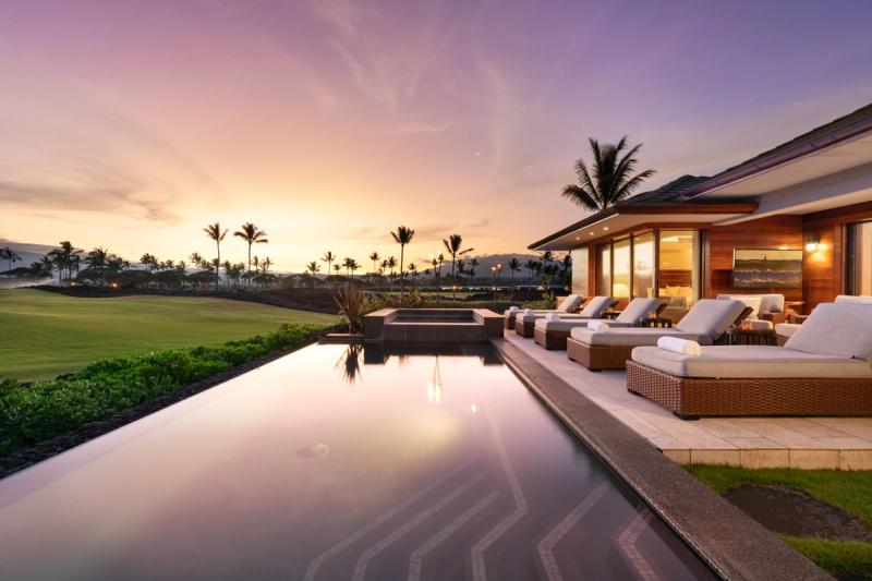 Golden hour poolside at Hawaii vacation rental