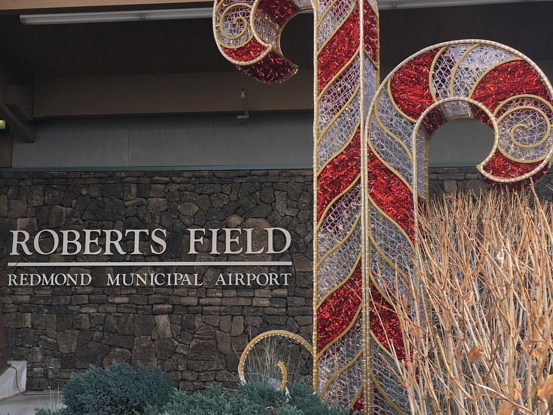 Roberts Field at Redmond Municipal Airport decorated with giant candy cane sculptures welcomes travelers to Central Oregon. This is the closest airport to Sunriver, making it easy to start your vacation adventure.