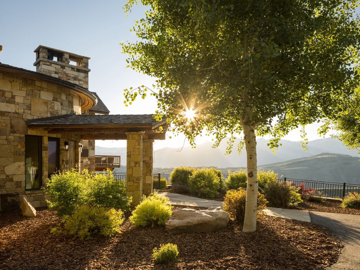 Rustic modern cabin with sweeping mountain views, tall pine ceilings, and big windows that let in tons of light. Whether you're sipping coffee by the stone fireplace or relaxing on the deck, this retreat feels like a private hideaway tucked in the Tetons.
