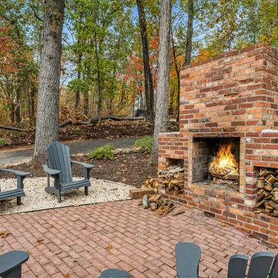 Outdoor living sapce with fireplace at Patriot Cabin on Lake Hartwell.