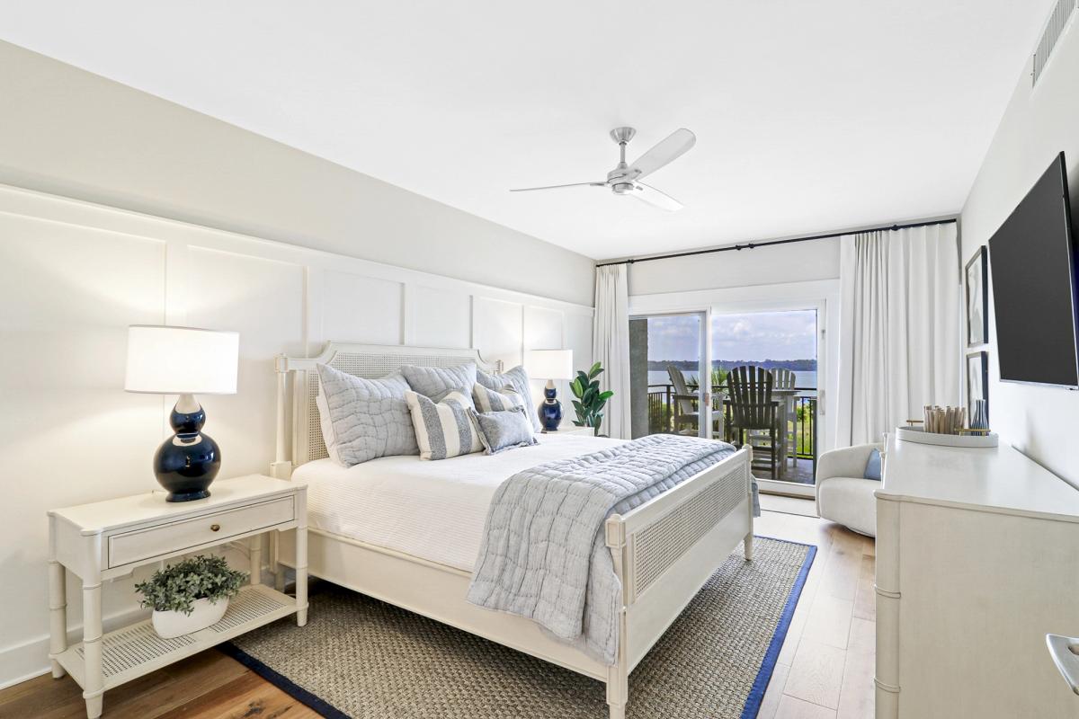 Primary bedroom in 1888 Beachside Tennis Villa.