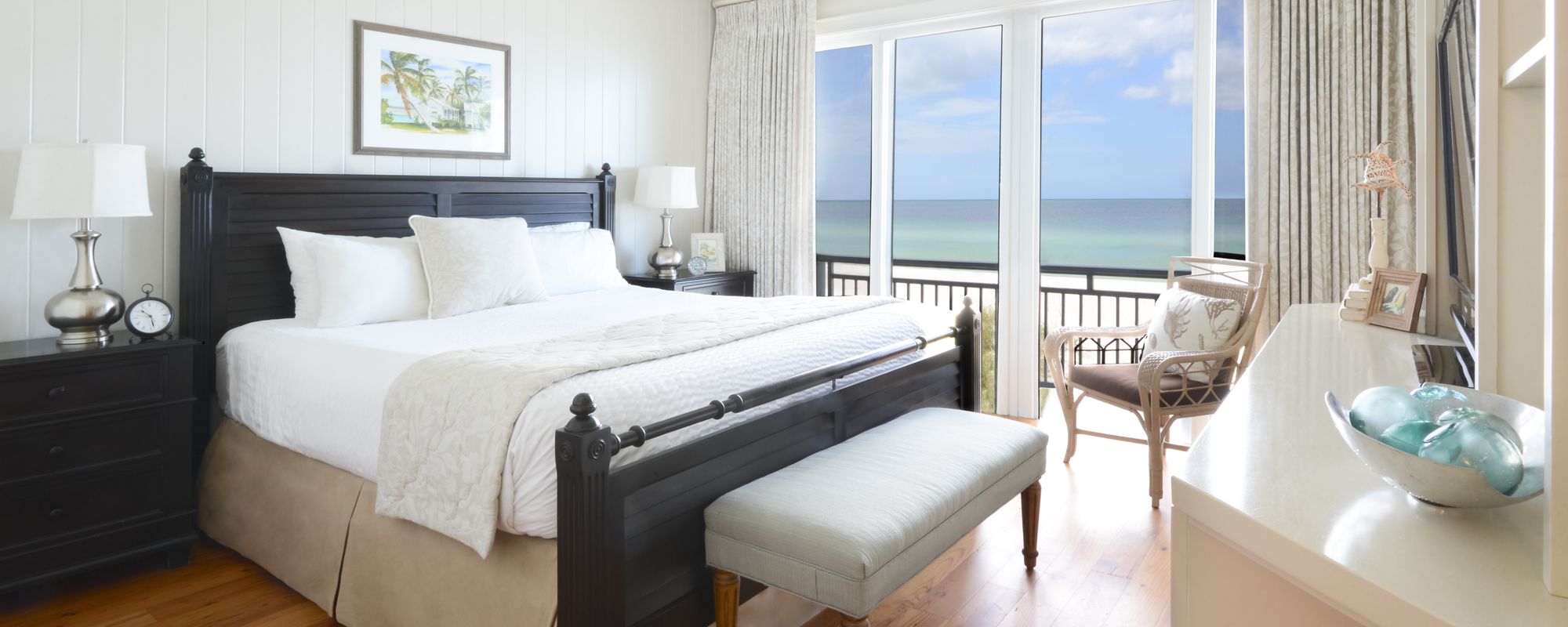 Coastal chic primary bedroom at an Anna Maria Island vacation rental.