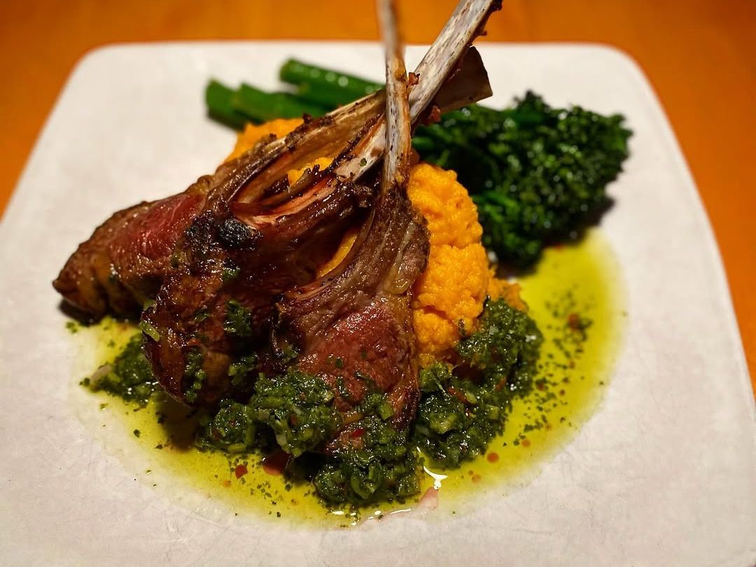 Perfectly seared lamb chops served with mashed sweet potatoes, broccolini, and fresh chimichurri. A rustic dish full of hearty flavors and bold colors.