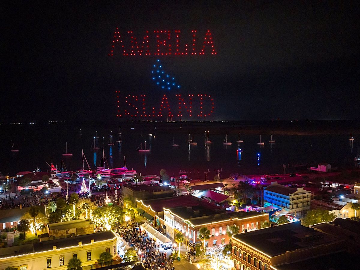 Aerial View of Fernandina Beach at Night With 4th Of July Fireworks