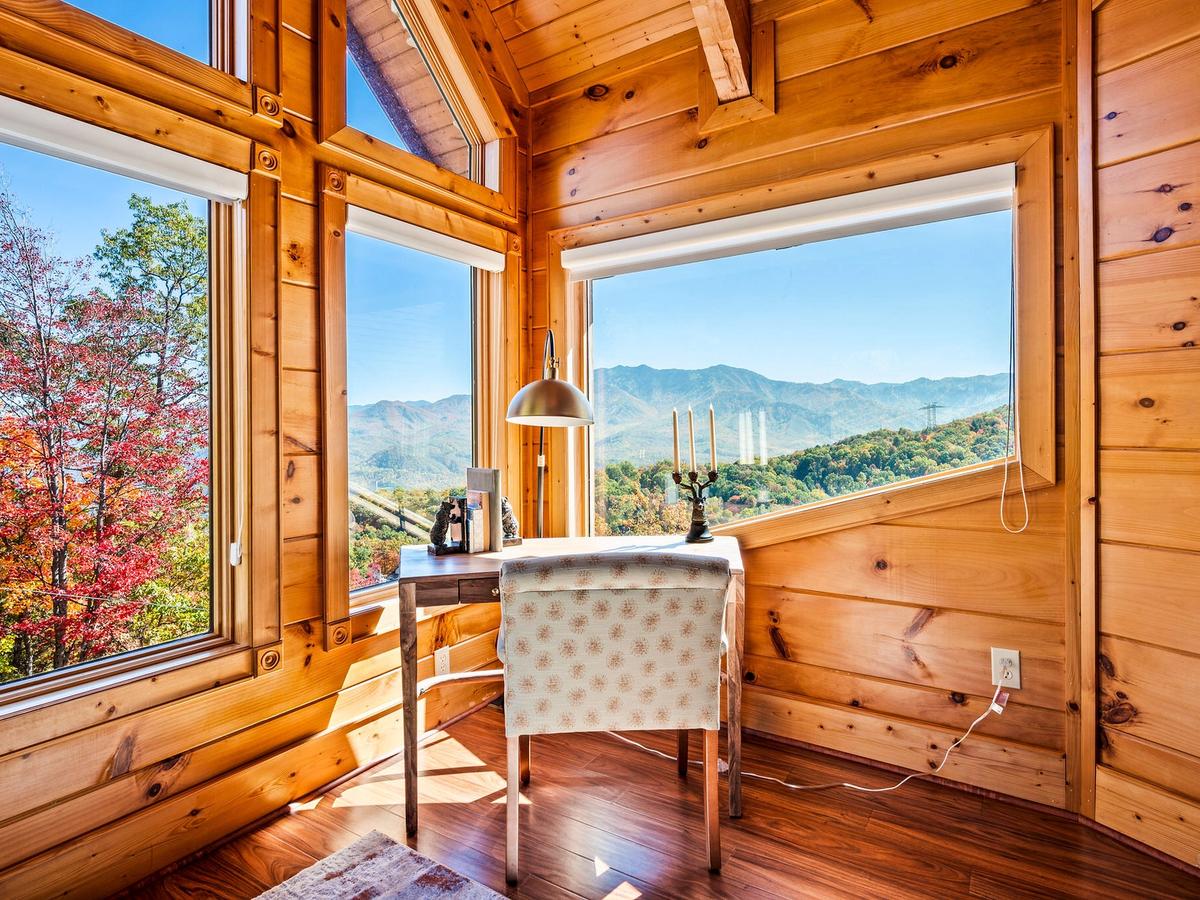 Room for work with windows overlooking the mountains