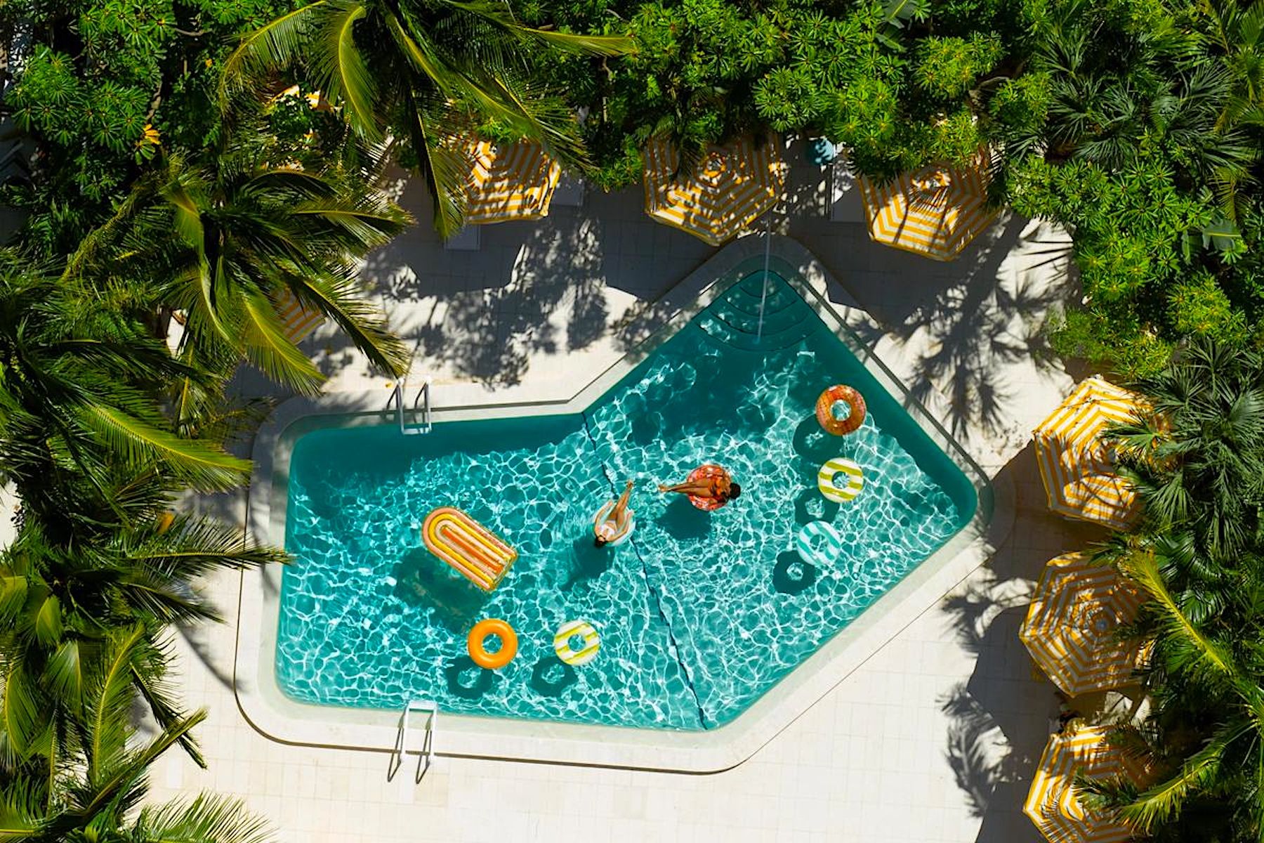 Aerial View of pool at Mello On The Beach AMI Luxury Condos 