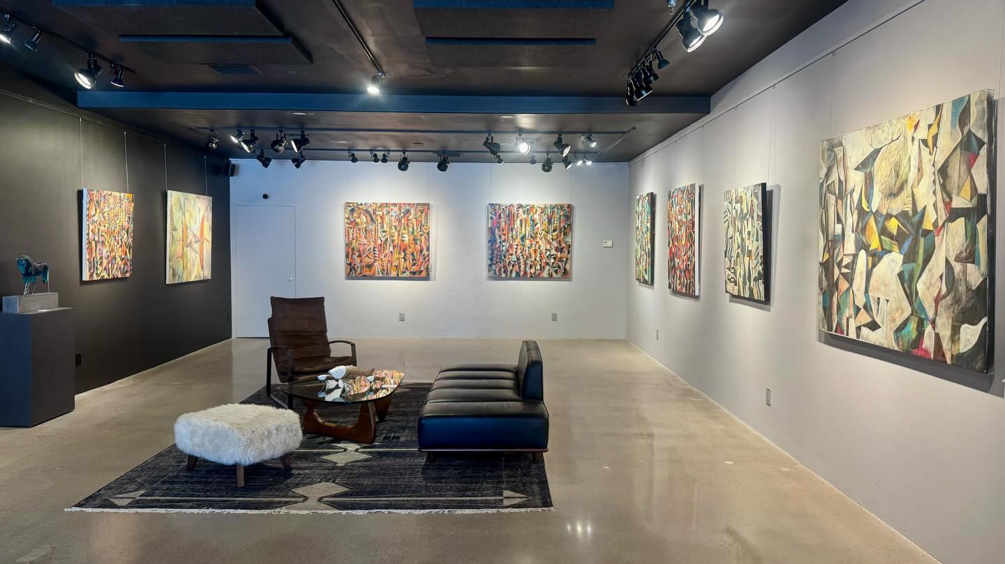 Altamira Fine Art gallery displays colorful abstract paintings in a modern, open space. The clean layout allows visitors to focus on each artwork. It’s a must-visit spot for art lovers in Jackson Hole.
