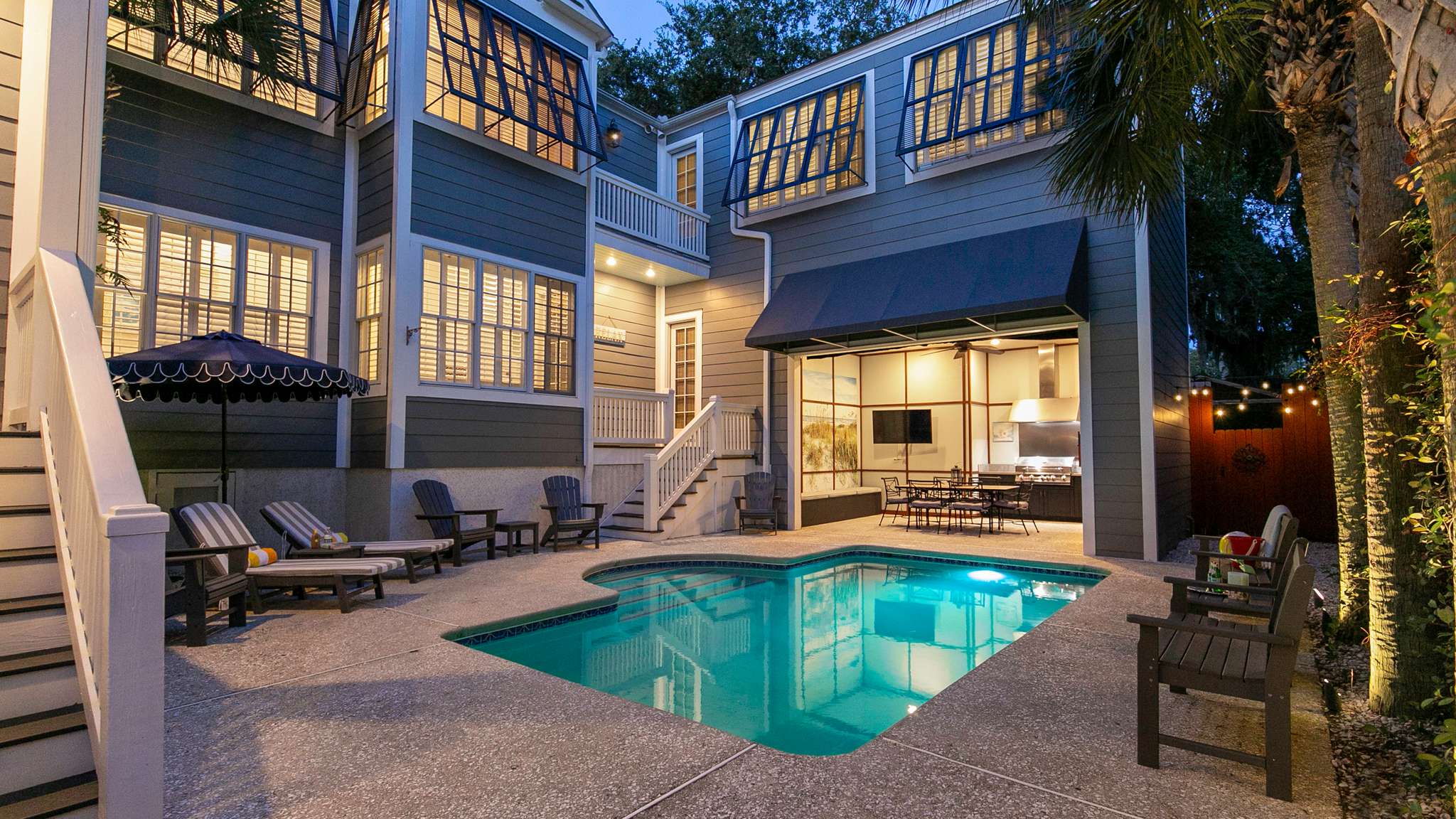 Backyard with Private Pool and Lounge Chairs at Luxury St. Simons Island Vacation Rental