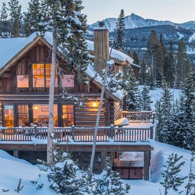 Lodge view with snowy mountains