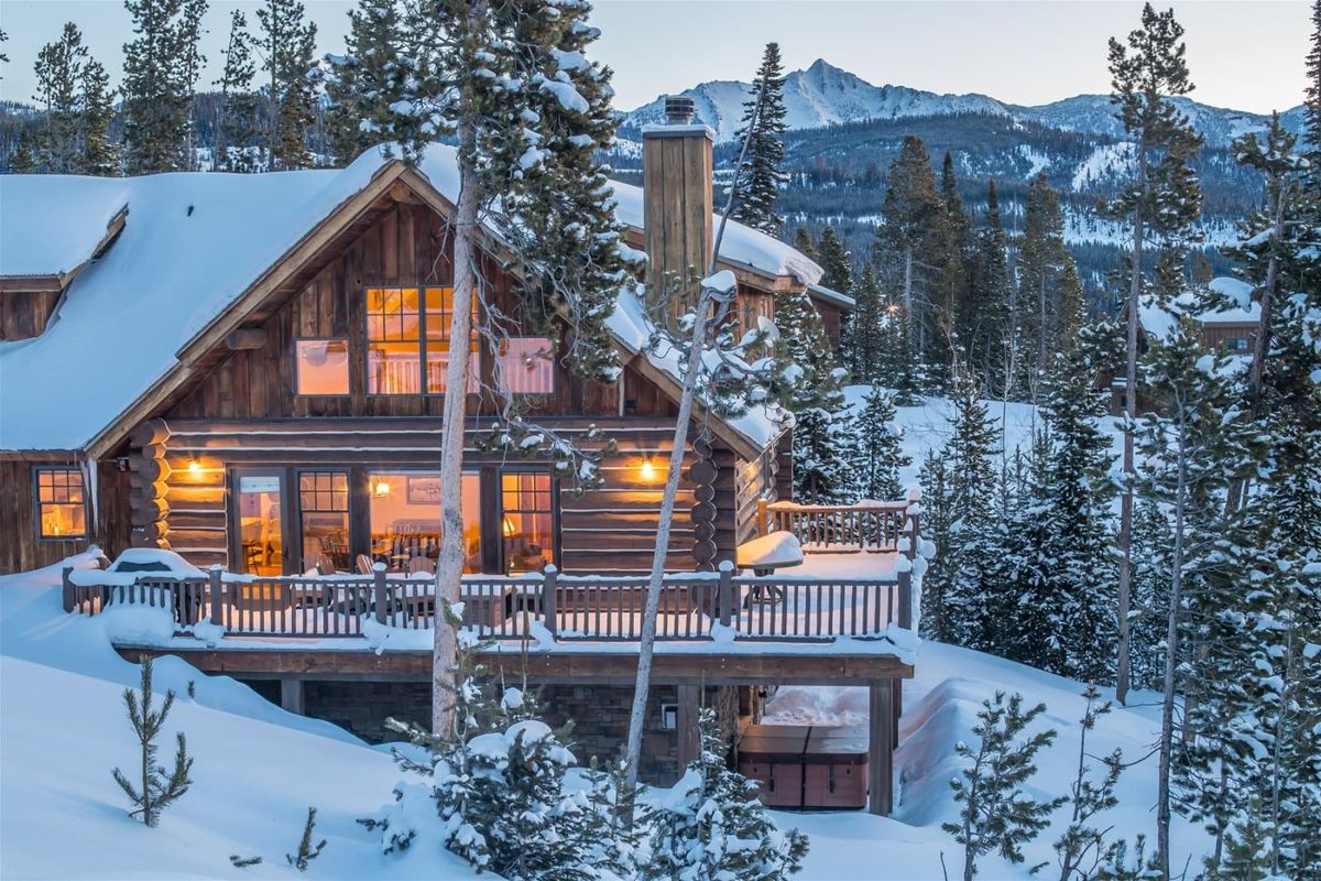 Lodge view with snowy mountains