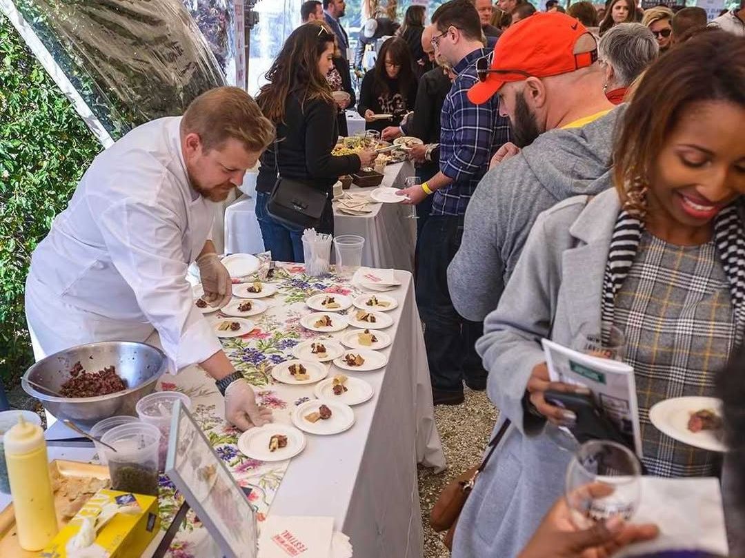 Chefs and food lovers gather under a white tent to enjoy gourmet tastings at the Martha’s Vineyard Food & Wine Festival. The vibrant energy, plated bites, and island-grown ingredients make it a must for every food enthusiast.
