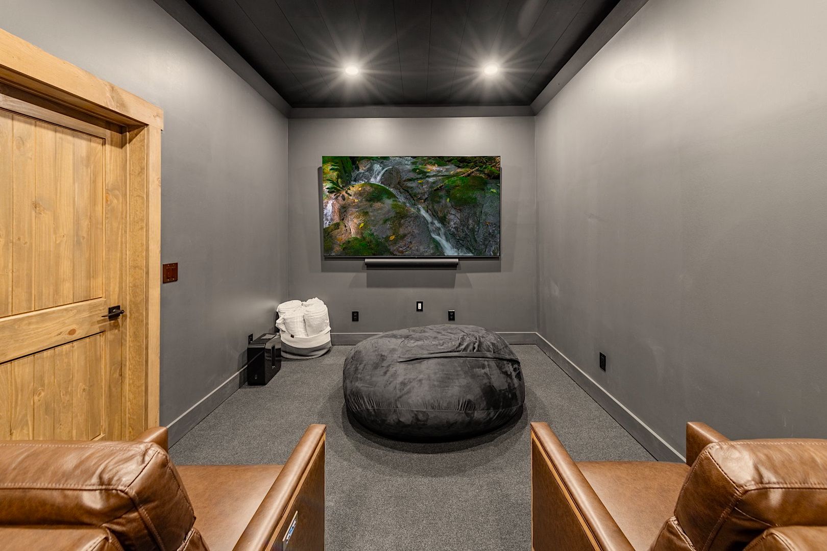 Cozy Home Theater With Recliners in Blue Ridge Luxury Cabin Rental