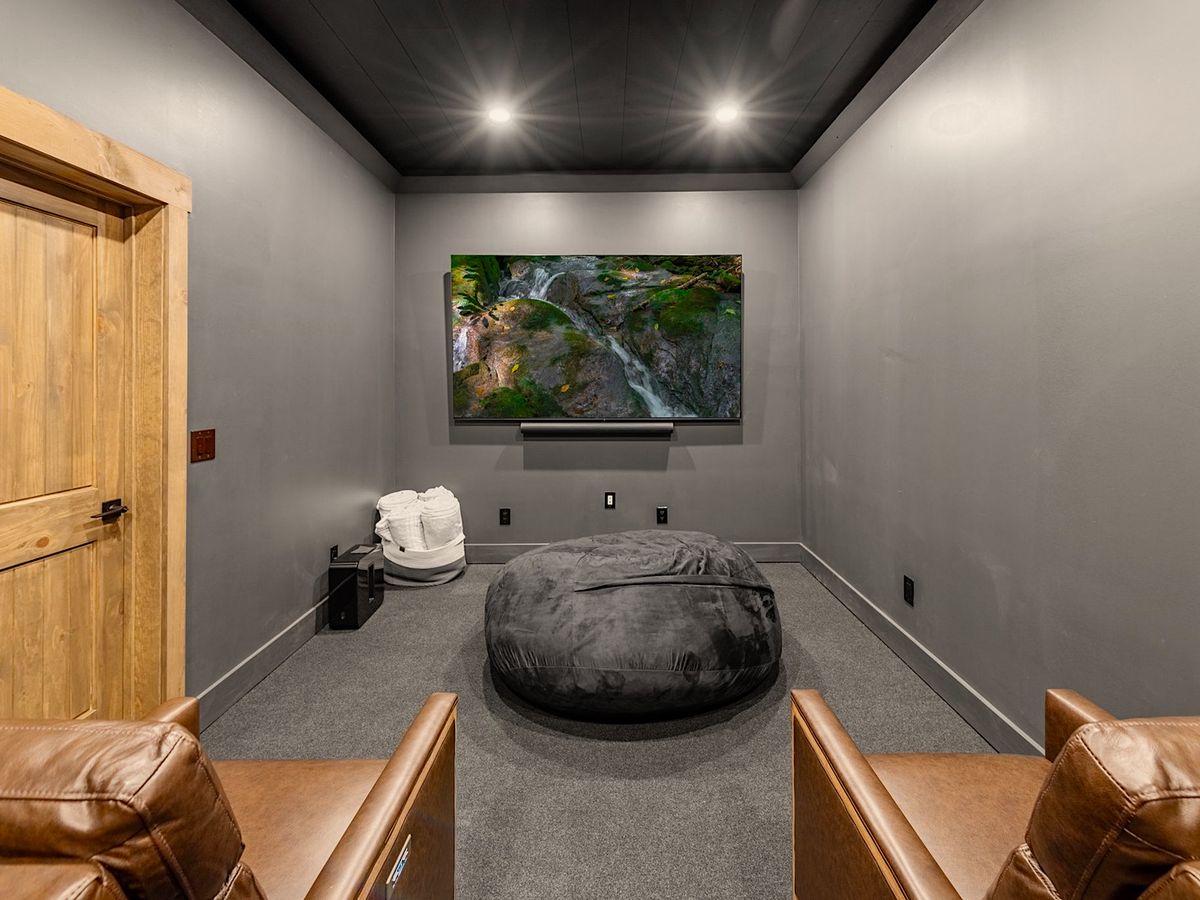 Cozy Home Theater With Recliners in Blue Ridge Luxury Cabin Rental
