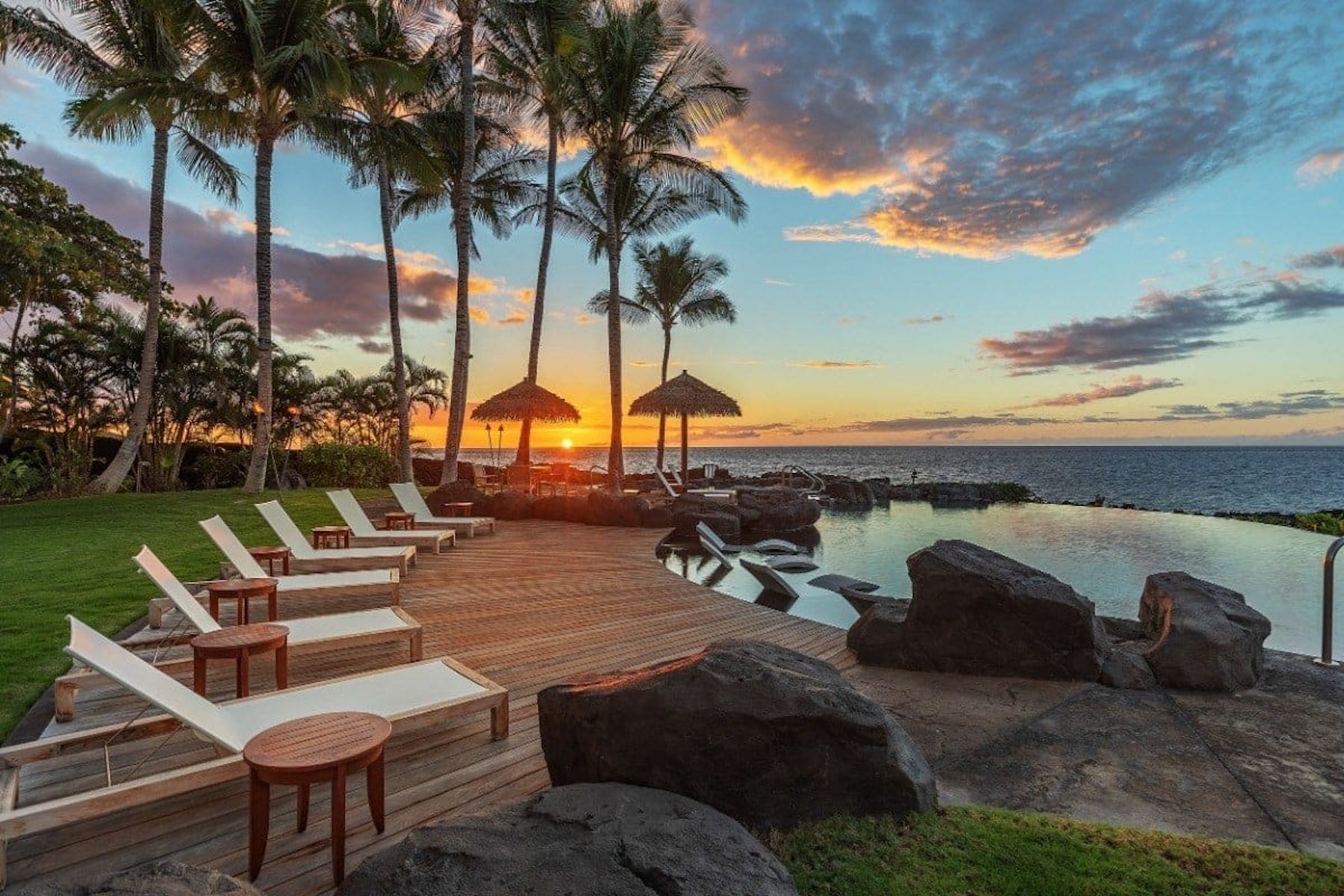 Lounge hairs and Private Pool With Ocean Views At A Big Island Luxury Vacation Rental