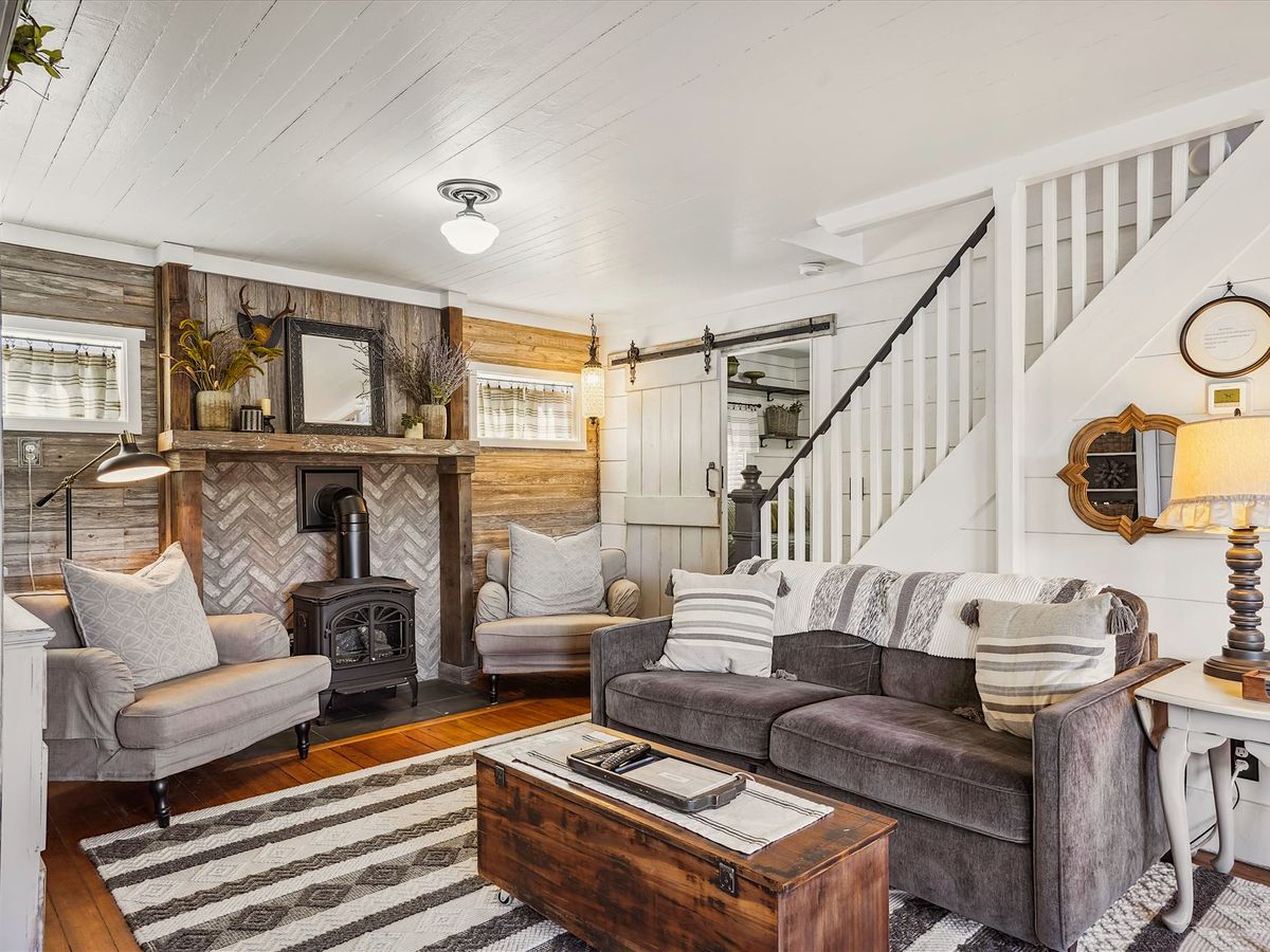 Cozy Living Room With Wood Stove in Cannon Beach Vacation Rental