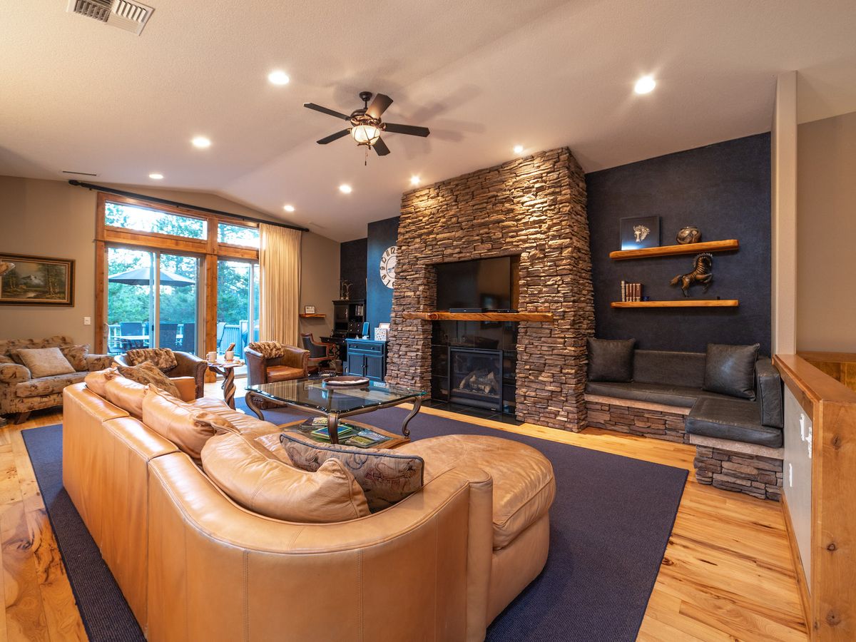 Living Room With Fireplace in Luxury Sunriver Vacation Rental