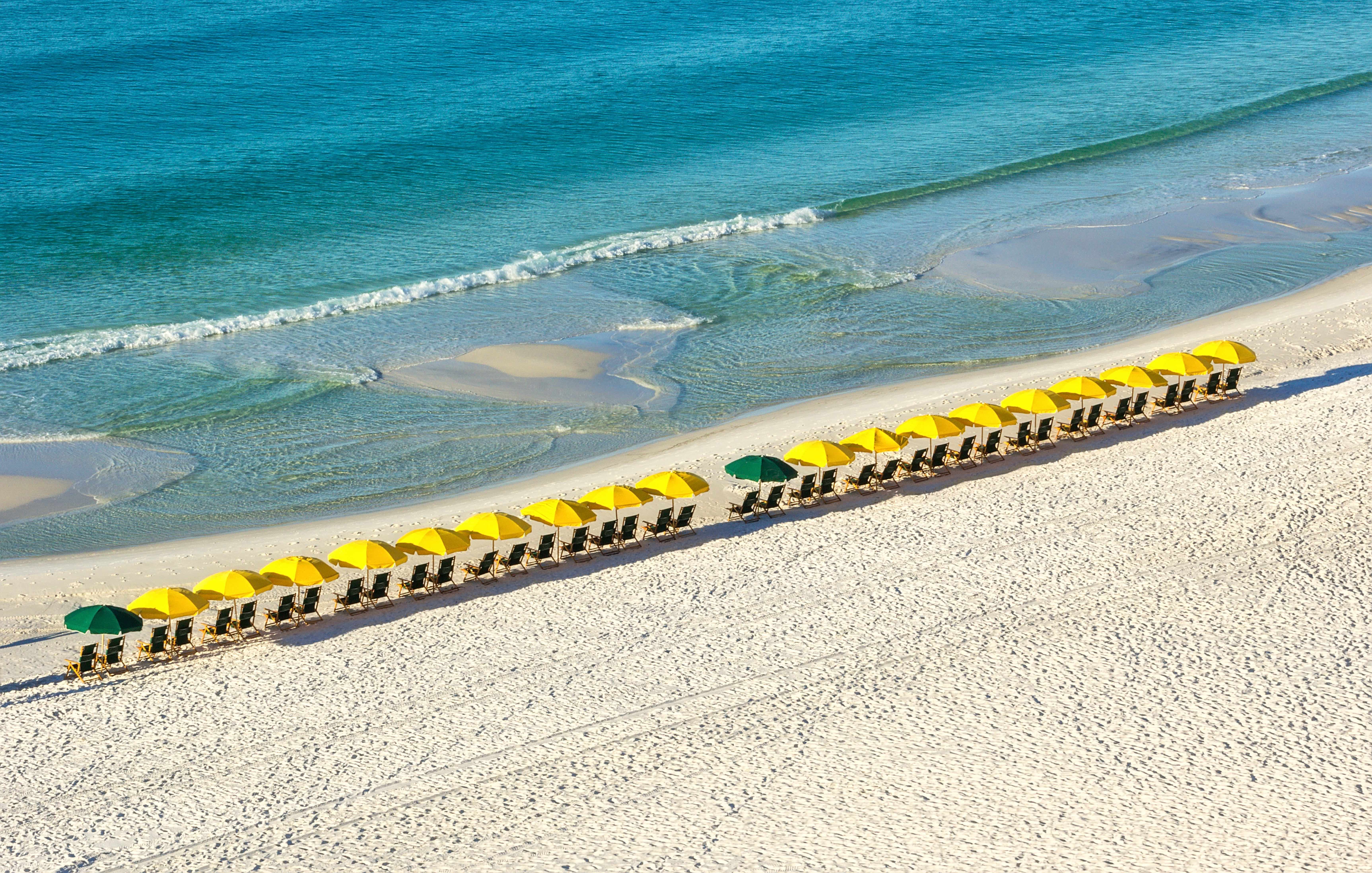 View of the Gulf and Chairs with Umbrellas on Beach in Destin Florida 