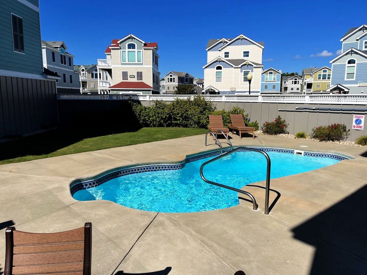 Private pool at vacation rental with views of other houses