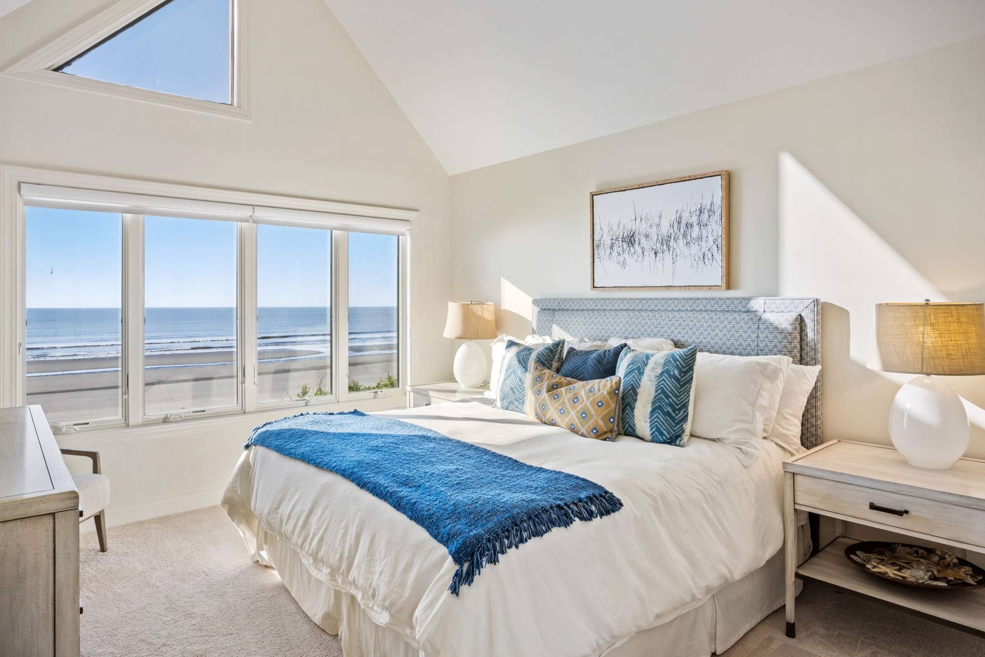 Interior of bedroom with beachfront views