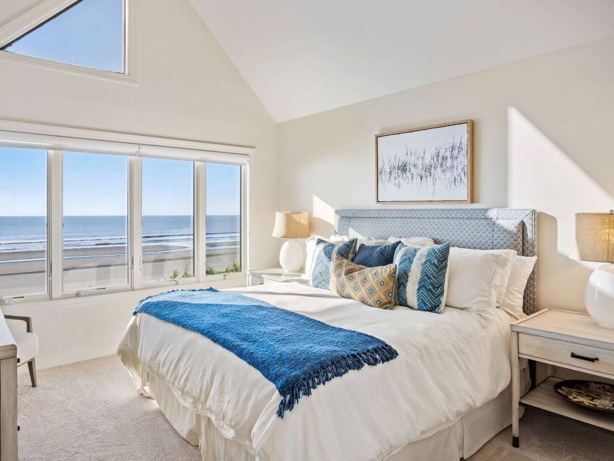Interior of bedroom with beachfront views