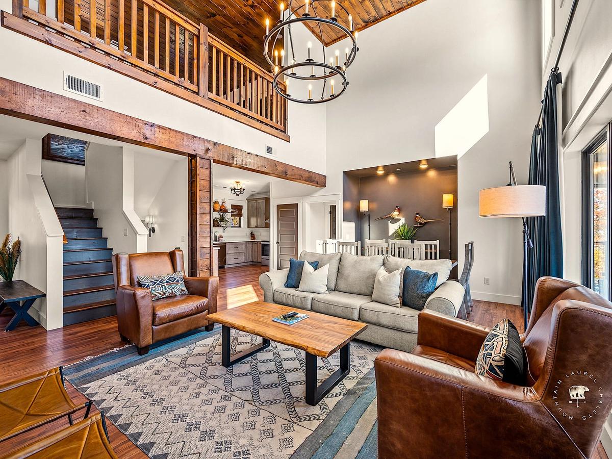 Beautiful Living Room, Dining Room, and Kitchen in Luxury Gatlinburg Vacation Rental